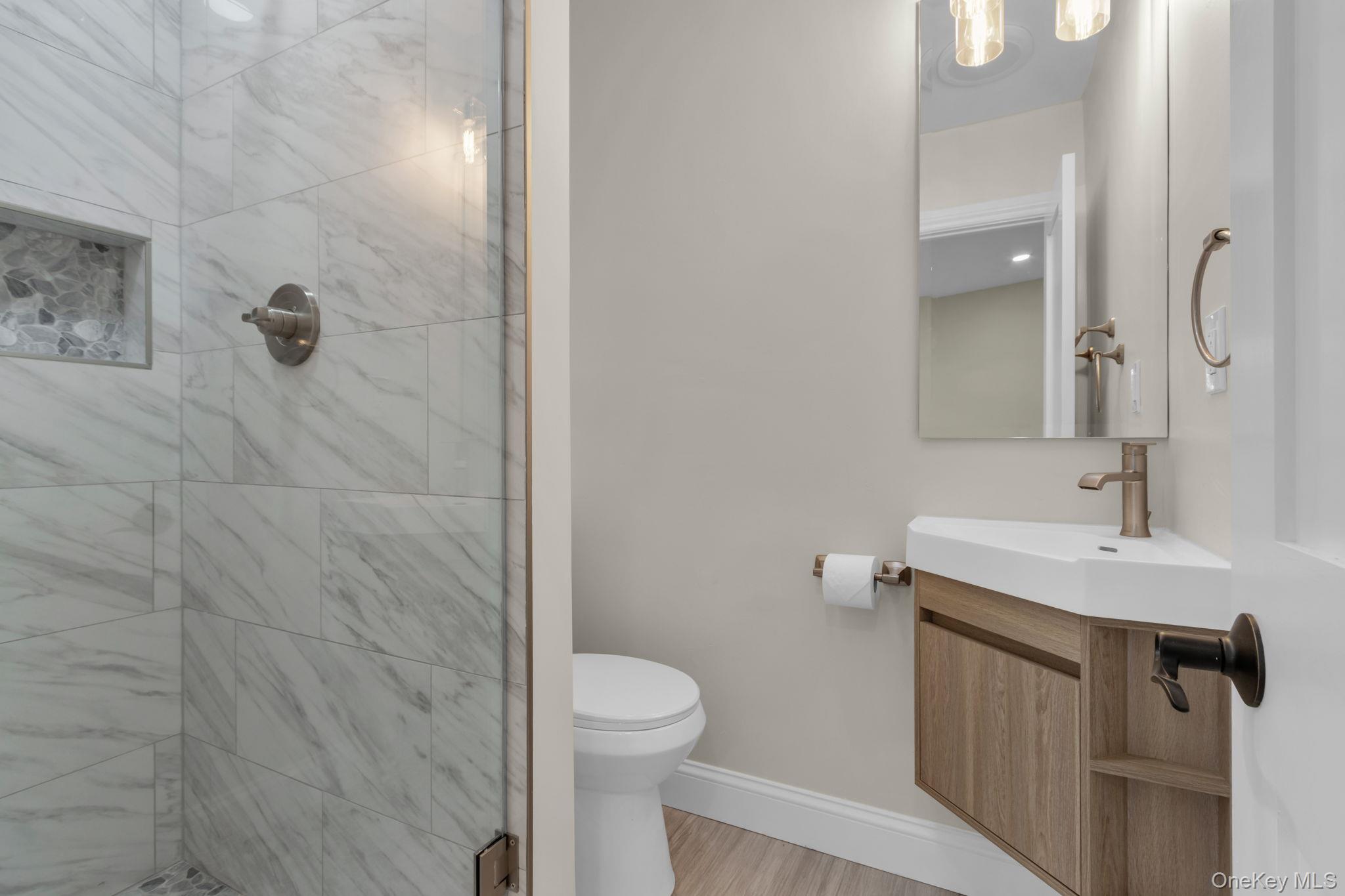 21 Reading Road Patterson, NY 12563 - Photo 17 of 39 a bathroom with a sink toilet and shower