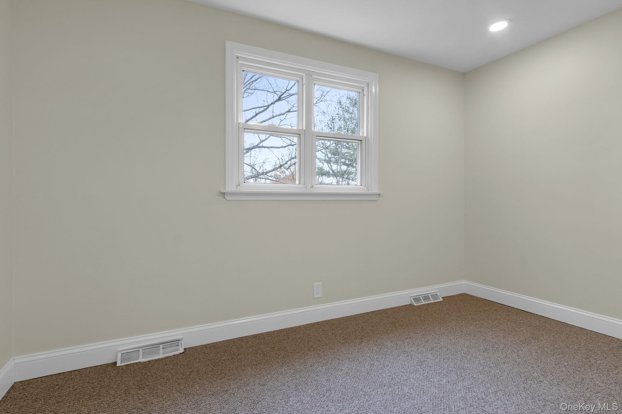 21 Reading Road Patterson, NY 12563 - Photo 23 of 39 an empty room with a window