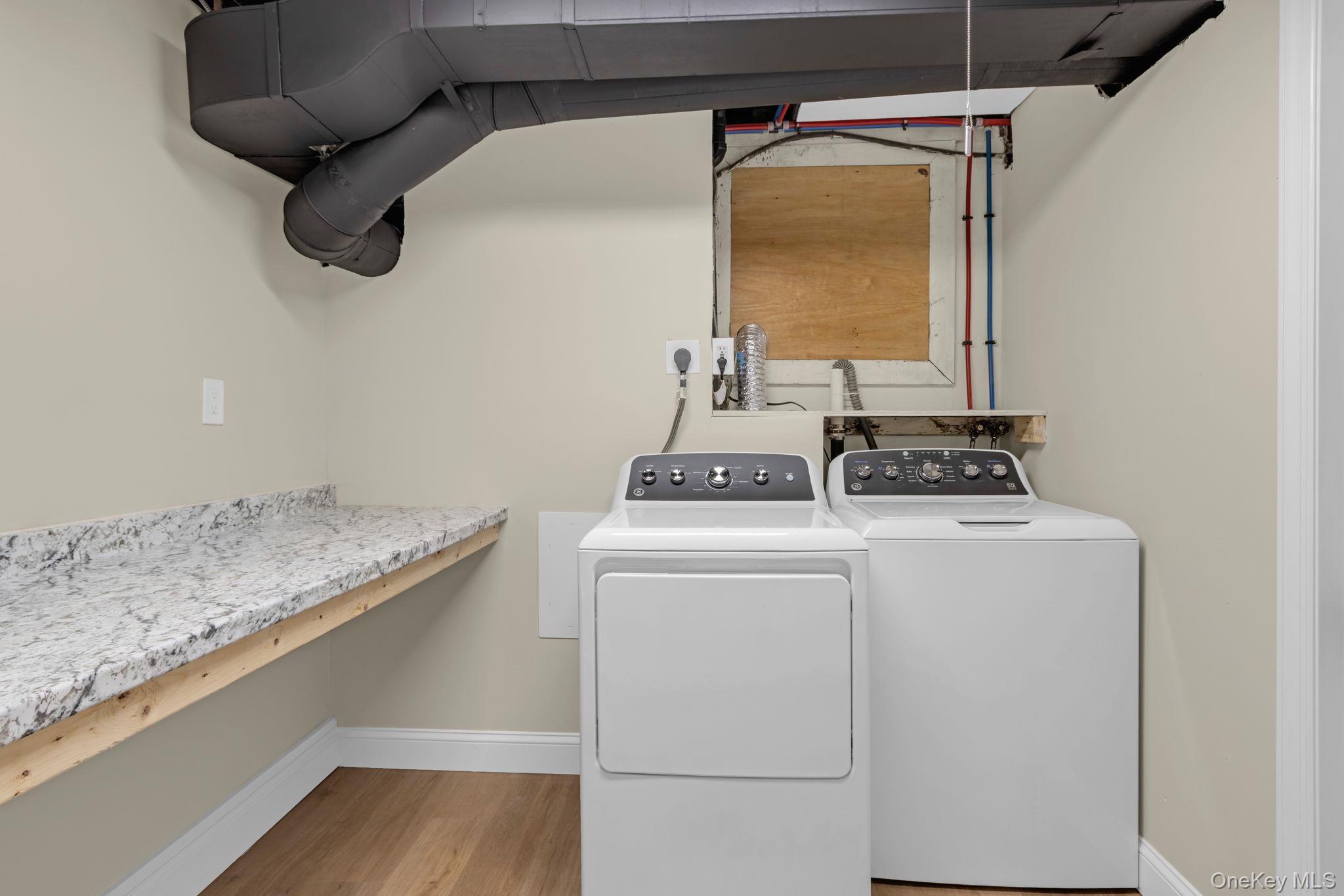 21 Reading Road Patterson, NY 12563 - Photo 34 of 39 a utility room with dryer and washer