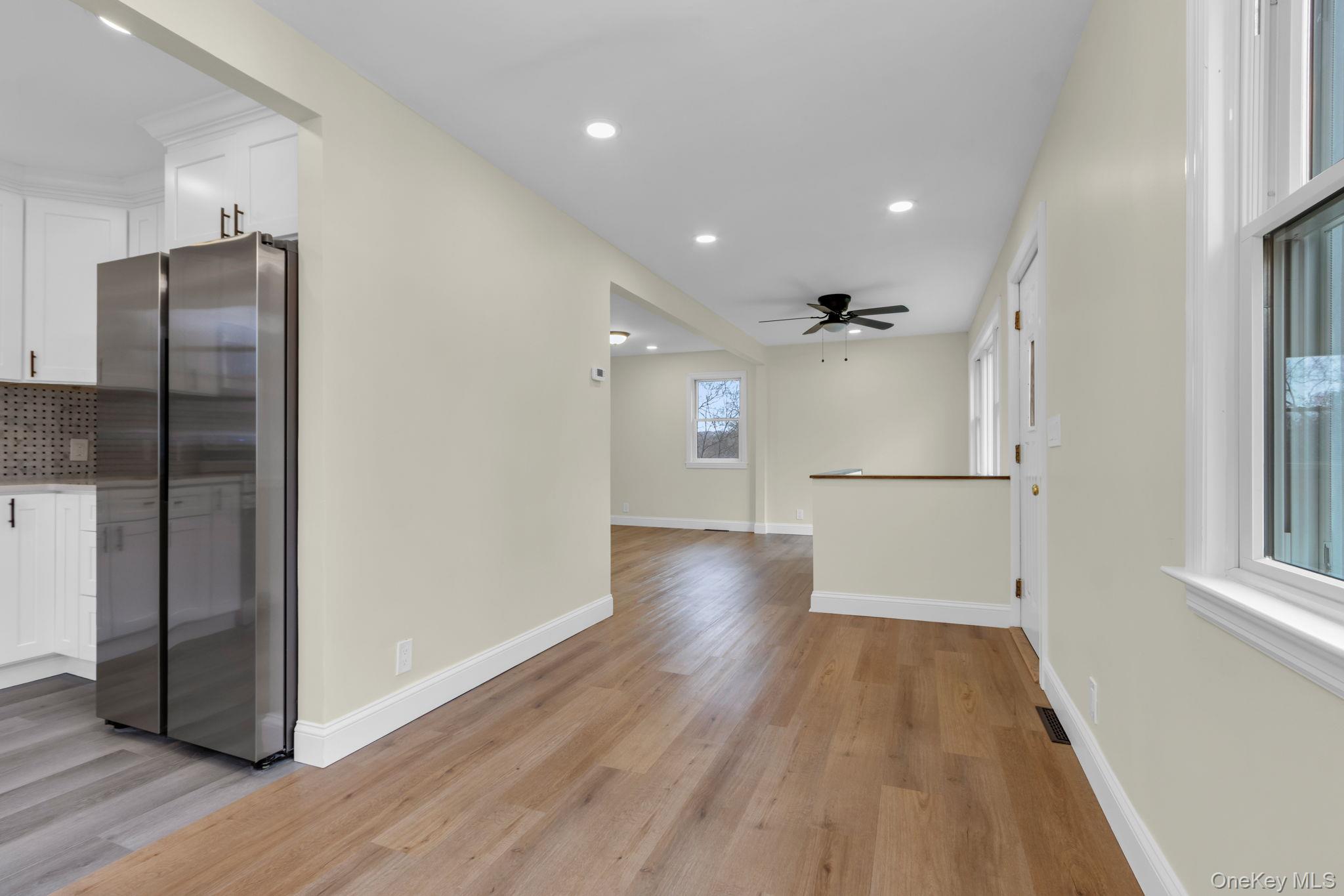 21 Reading Road Patterson, NY 12563 - Photo 9 of 39 a view of a refrigerator in kitchen and wooden floor