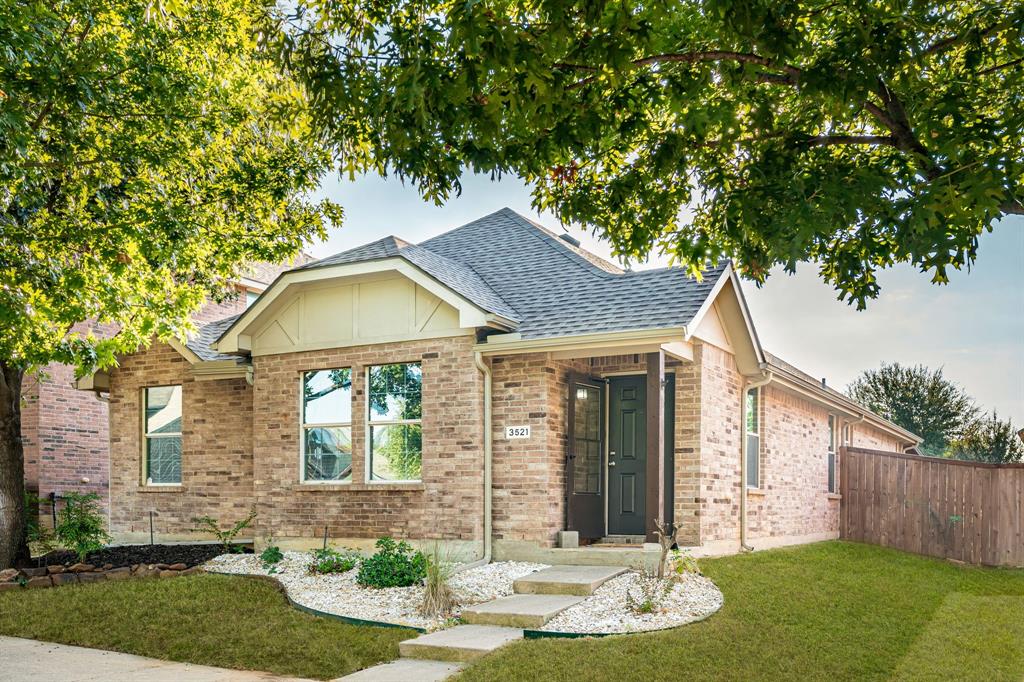 3521 Camino Real Trail Denton, TX 76208 - Photo 1 of 28 a front view of a house with garden