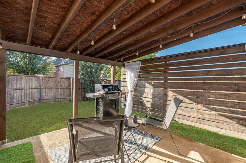 3521 Camino Real Trail Denton, TX 76208 - Photo 20 of 28 a patio with glass table and chairs