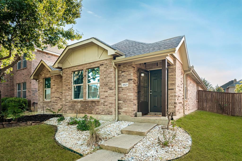 3521 Camino Real Trail Denton, TX 76208 - Photo 2 of 28 a front view of a house with garden