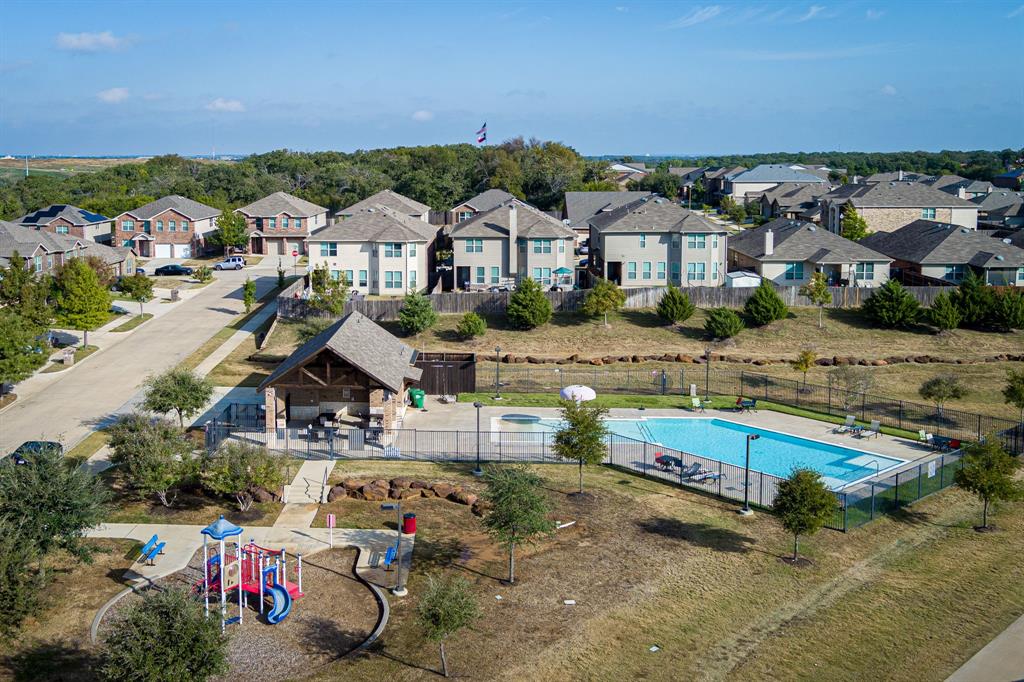 3521 Camino Real Trail Denton, TX 76208 - Photo 23 of 28 an aerial view of a house with a garden and mountain view