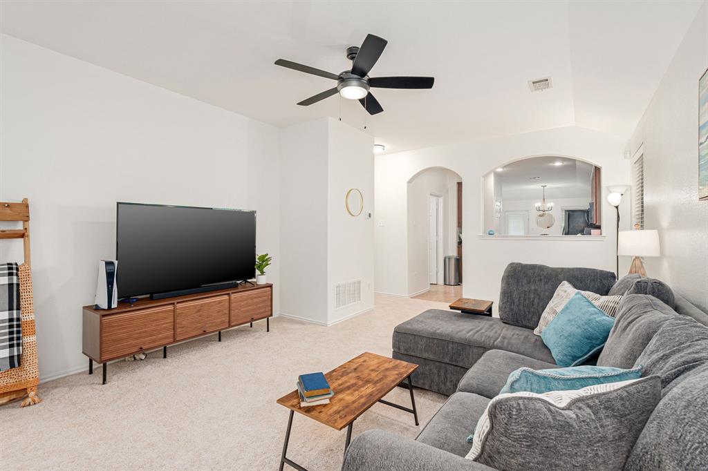 3521 Camino Real Trail Denton, TX 76208 - Photo 3 of 28 a living room with furniture and a flat screen tv