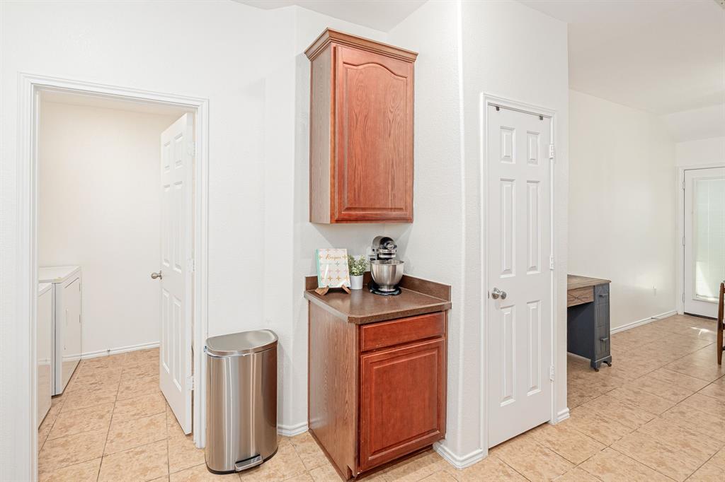 3521 Camino Real Trail Denton, TX 76208 - Photo 8 of 28 a room with storage and utility