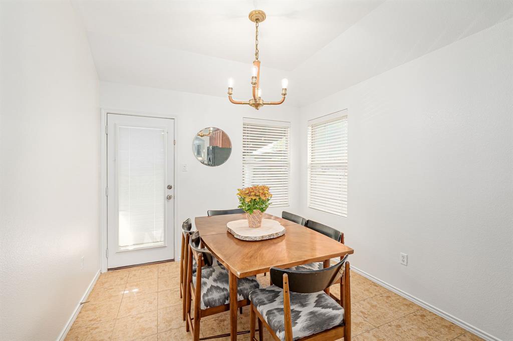 3521 Camino Real Trail Denton, TX 76208 - Photo 9 of 28 a dining room with a table and chairs