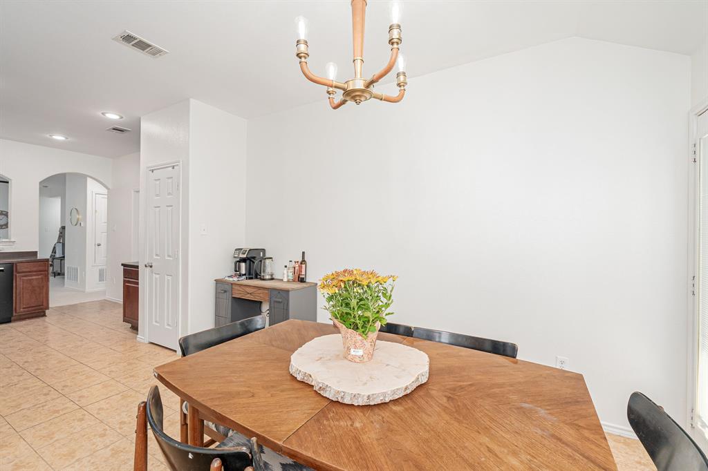 3521 Camino Real Trail Denton, TX 76208 - Photo 10 of 28 a dining room with furniture and wooden floor
