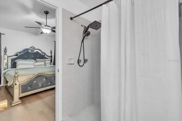 a view of a room with air conditioner and windows