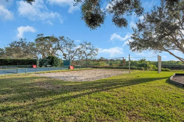 a view of a golf course with a lake