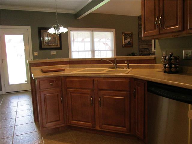 3555 Rabbit Run Trail Clarksville, TN 37043 - Photo 9 of 19 View of the Eat-In Kitchen Consist of Tile Flooring and a Breakfast Nook.