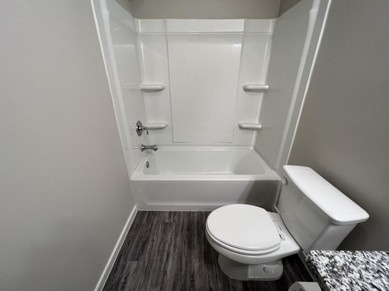 2139 North Texas Avenue, Unit A Lubbock, TX 79403 - Photo 17 of 21 a bathroom with a sink and a toilet