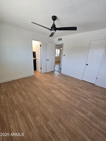 a view of an empty room with a window