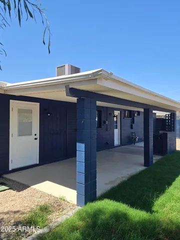 a house view with a backyard space