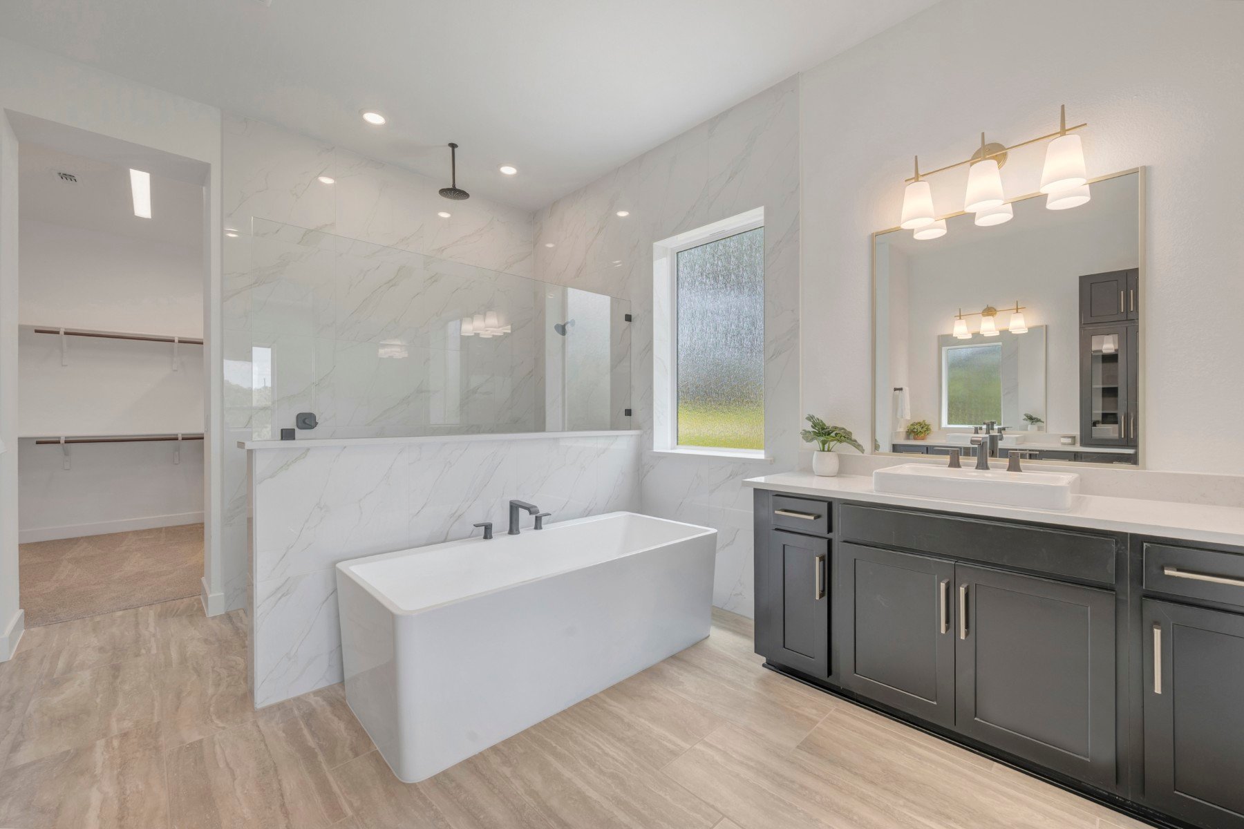 438 Rees Lndg Road Spicewood, TX 78669 - Photo 28 of 40 Owner's Bathroom (Staged)