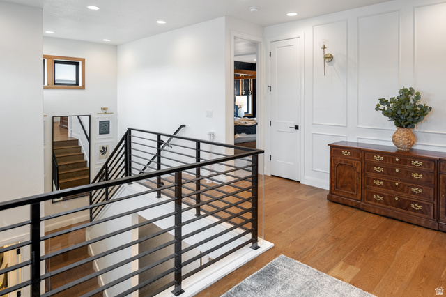 11617 South Wildrye Field Way Draper, UT 84020 - Photo 16 of 53 Hall with an upstairs landing, recessed lighting, and solid white oak flooring