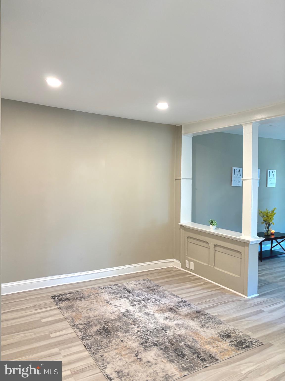 518 Columbus Road Burlington, NJ 08016 - Photo 6 of 26 a view of a livingroom with wooden floor and cabinet