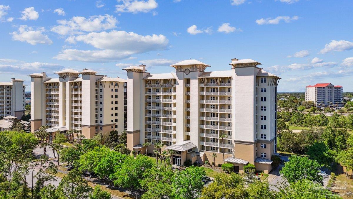 608 Lost Key Drive, Unit 201C Perdido Key, FL 32507 - Photo 1 of 42 a view of a city with tall buildings