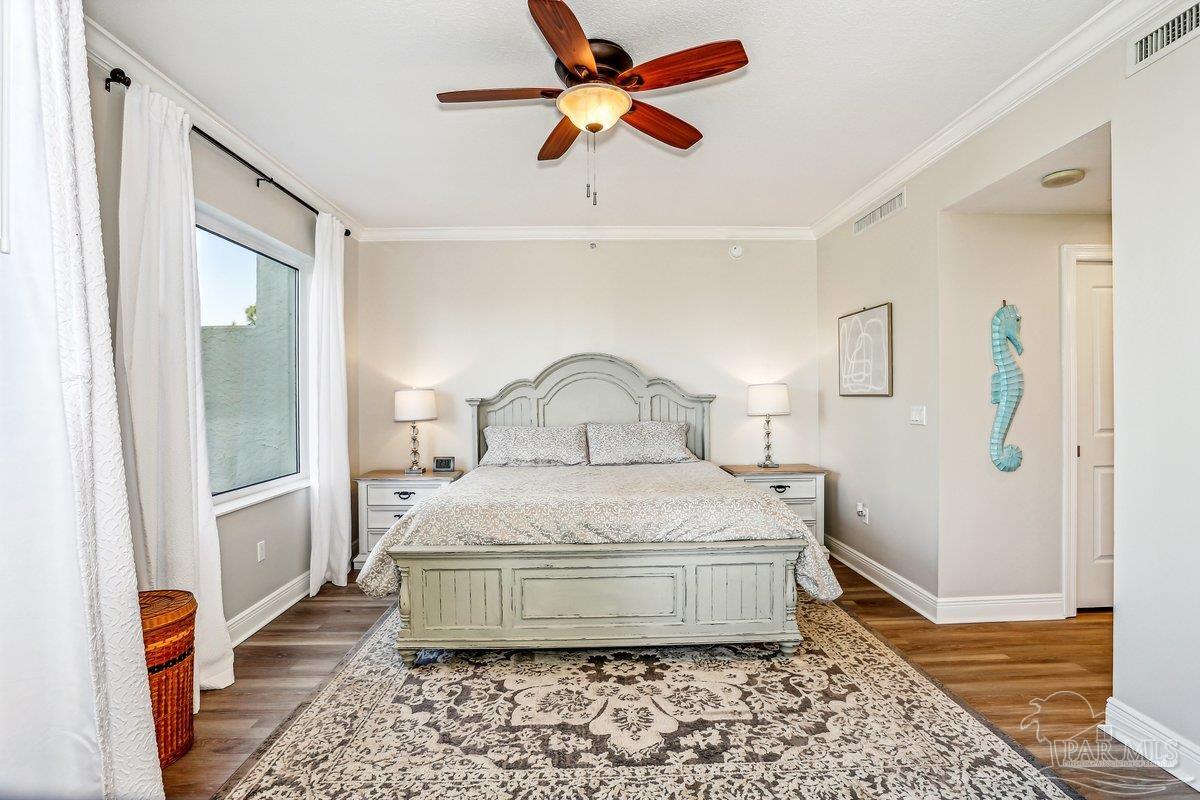 608 Lost Key Drive, Unit 201C Perdido Key, FL 32507 - Photo 17 of 42 a bedroom with a bed and a window