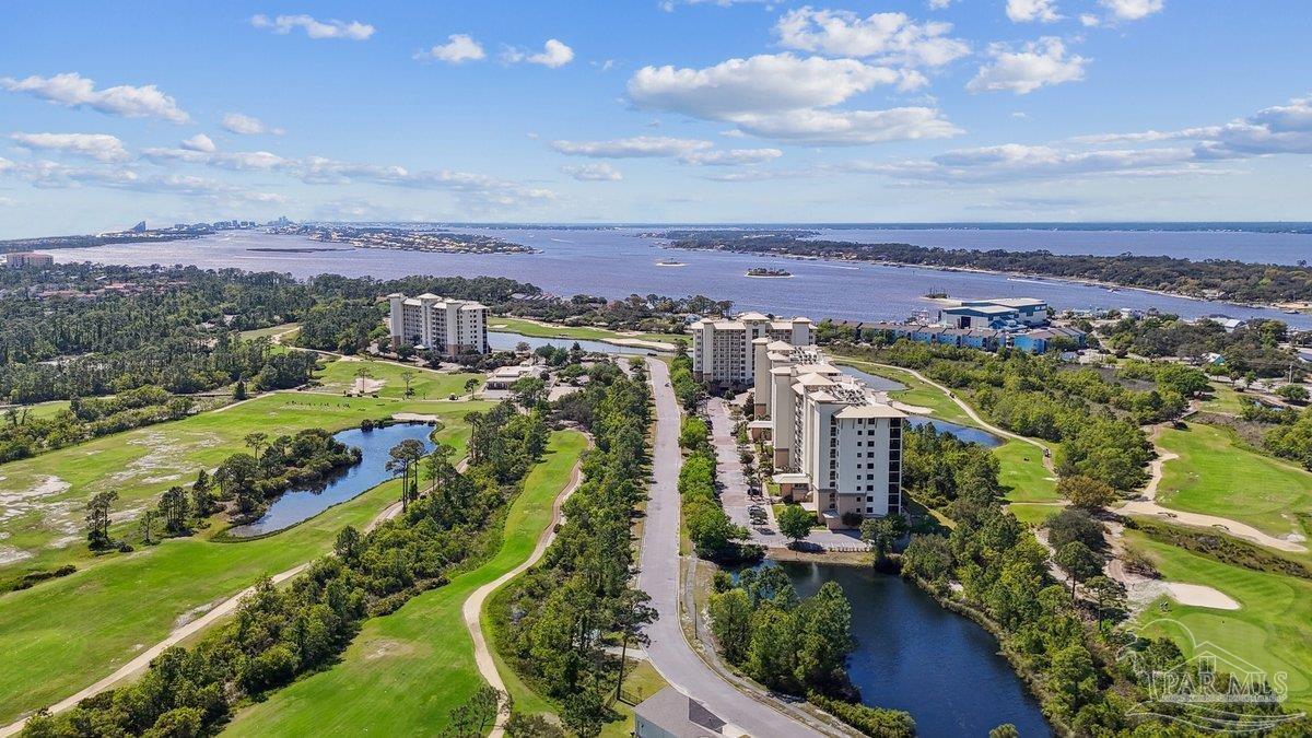 608 Lost Key Drive, Unit 201C Perdido Key, FL 32507 - Photo 2 of 42 an aerial view of residential houses with outdoor space and river