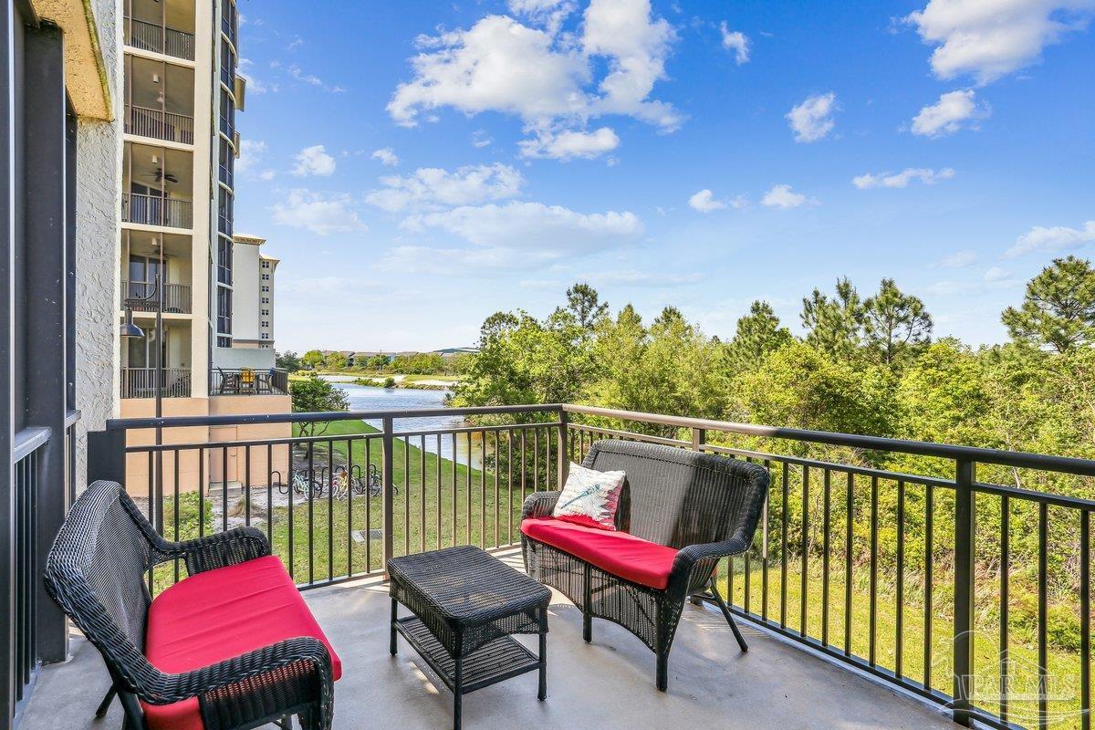 608 Lost Key Drive, Unit 201C Perdido Key, FL 32507 - Photo 27 of 42 a view of a balcony with couch