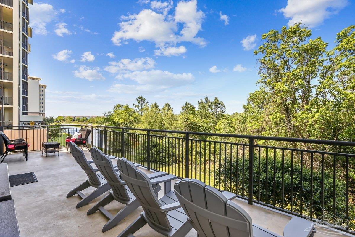608 Lost Key Drive, Unit 201C Perdido Key, FL 32507 - Photo 28 of 42 a view of a balcony with chairs