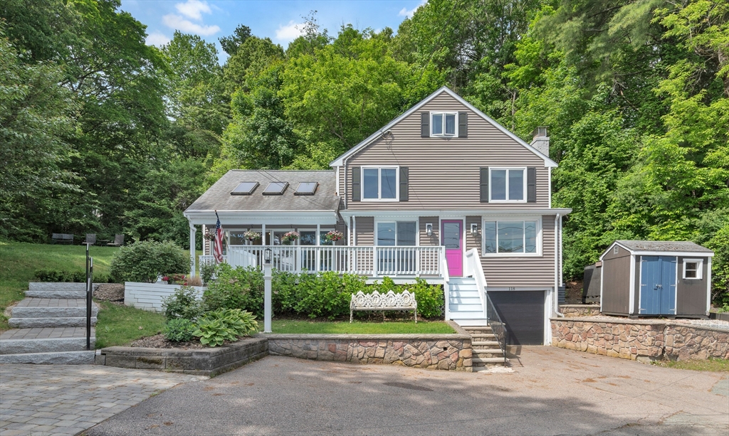 118 Woolford Road Wrentham, MA 02093 - Photo 1 of 41 a front view of a house with a yard and potted plants