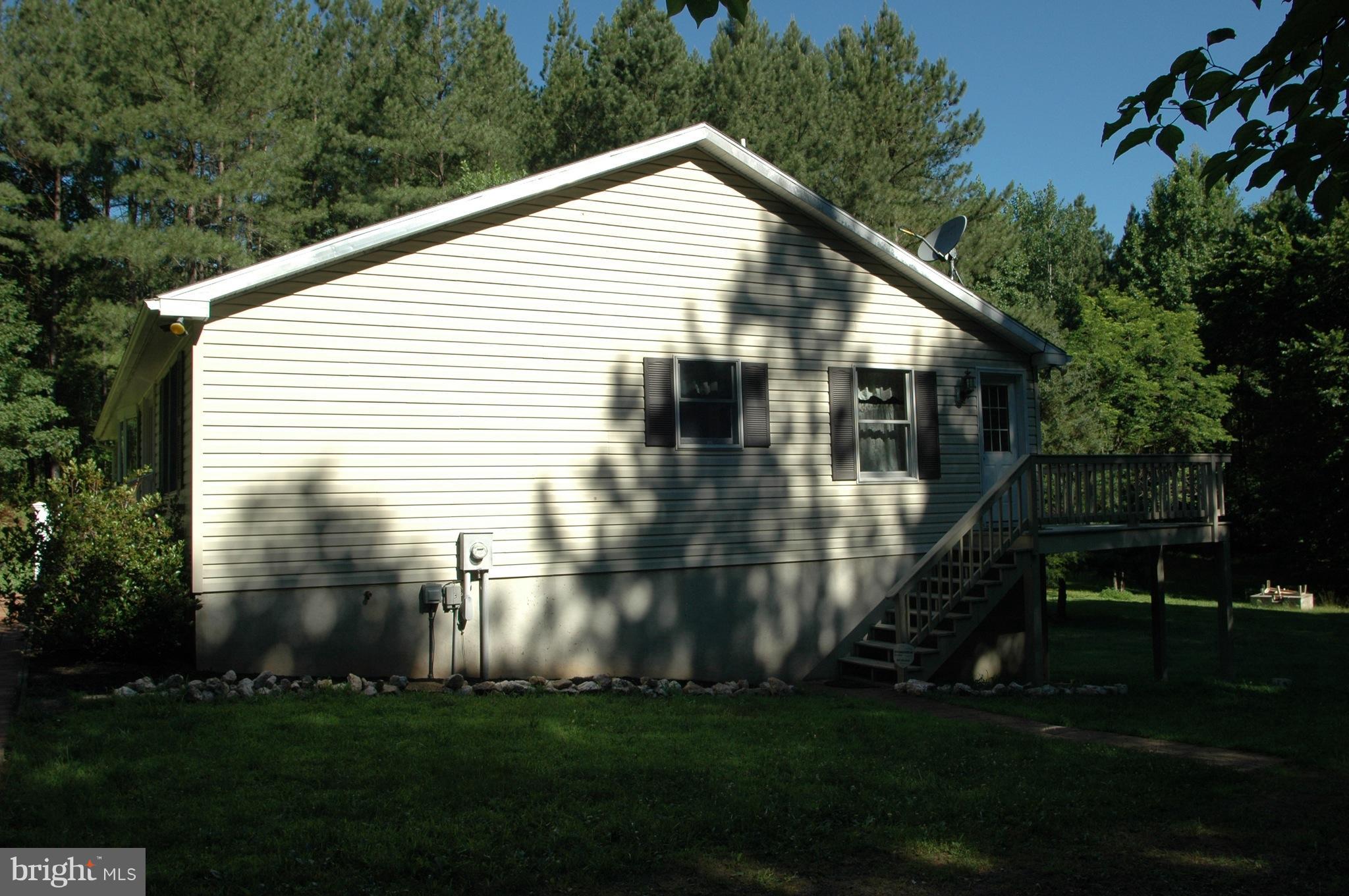 58 Middle Of Lane, Unit WAY Castleton, VA 22716 - Photo 24 of 25 Kitchen and Deck access