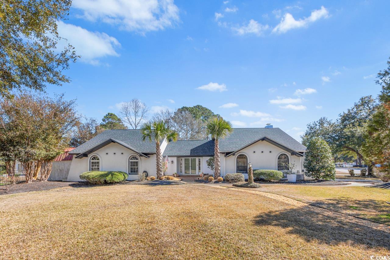 1007 Pyatt Street Georgetown, SC 29440 - Photo 1 of 31 Ranch-style house with a front yard, roof with shi