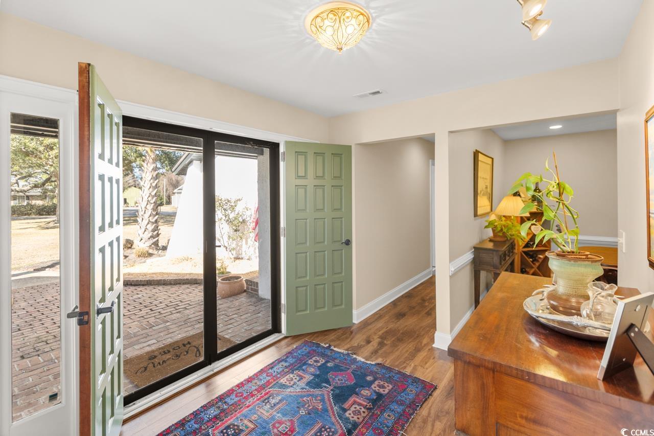 1007 Pyatt Street Georgetown, SC 29440 - Photo 4 of 31 Foyer featuring visible vents, baseboards, and woo