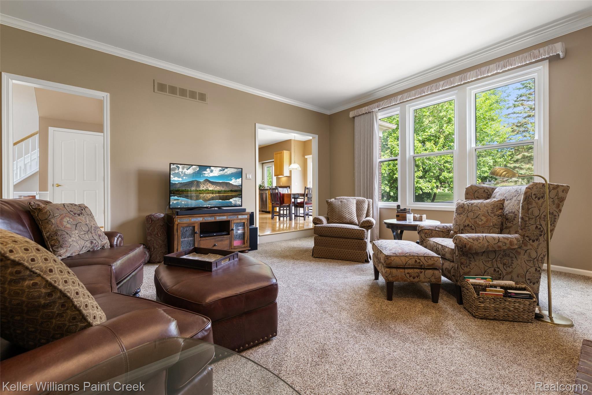1933 Catlin Drive Rochester, MI 48306 - Photo 21 of 54 Living room featuring carpet flooring and crown molding