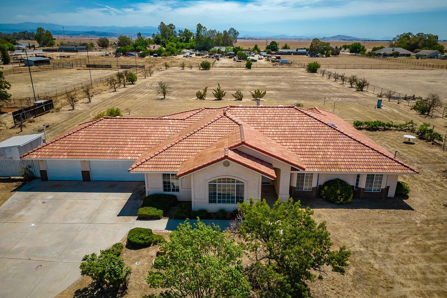 16601 La Canada Road Madera, CA 93636 - Photo 1 of 40 an aerial view of a house