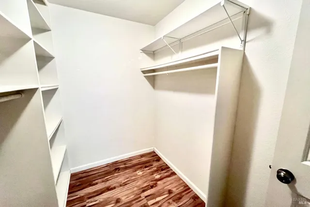 a view of a room with racks on the wall