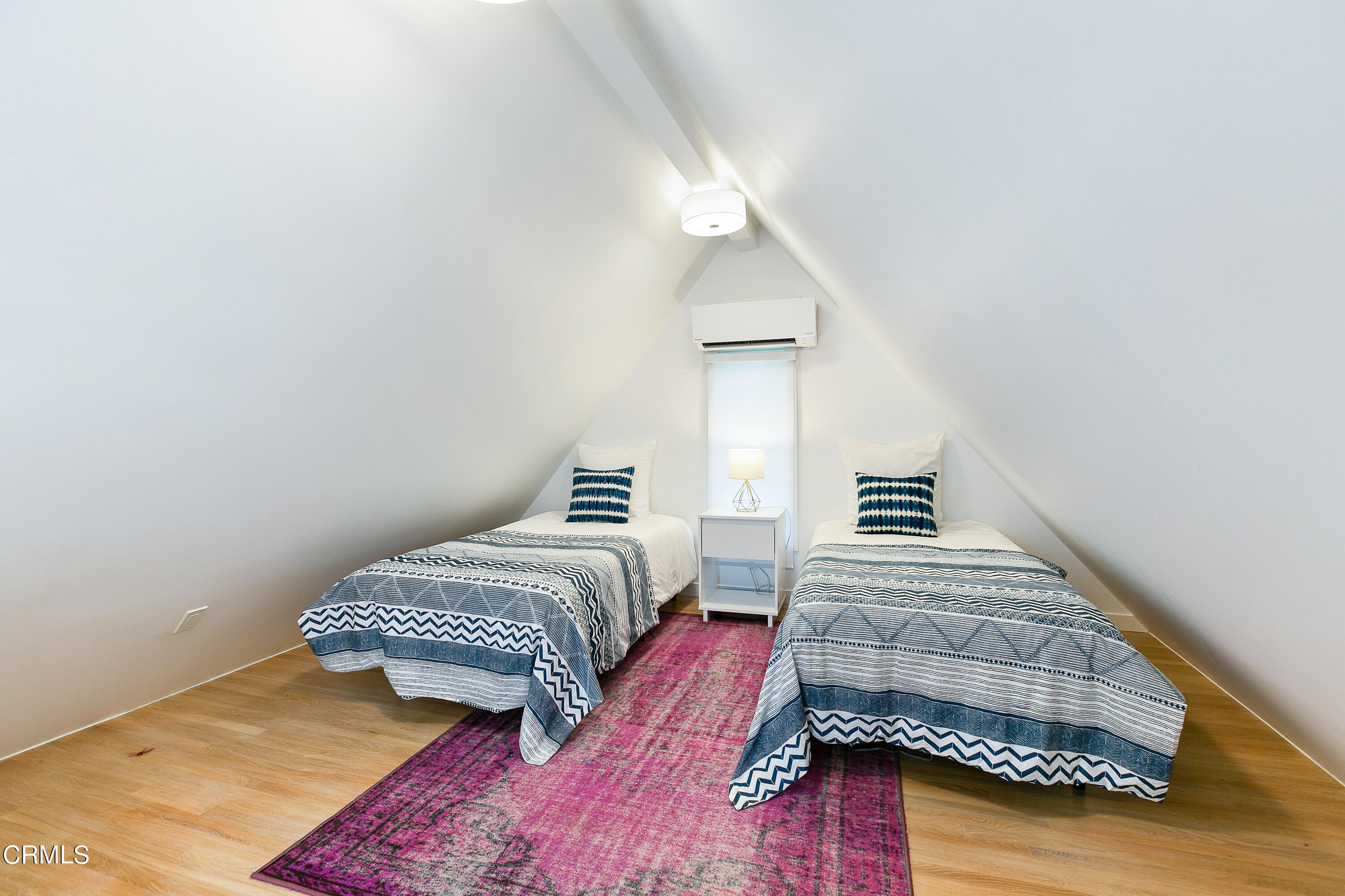 1665 Braeburn Road Altadena, CA 91001 - Photo 25 of 33 a bedroom with bed and window