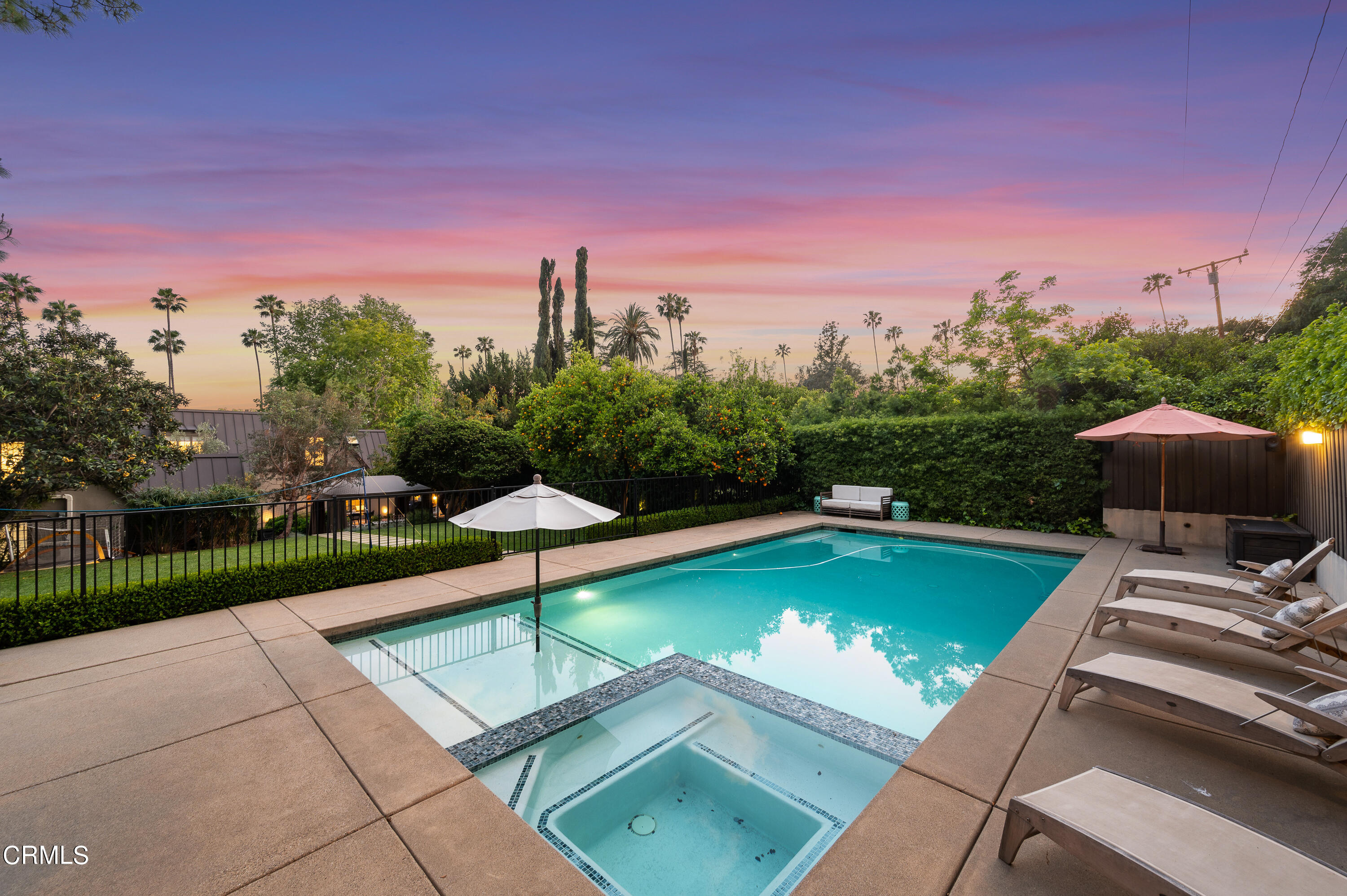 1665 Braeburn Road Altadena, CA 91001 - Photo 33 of 33 a view of a swimming pool with a yard and a fire pit