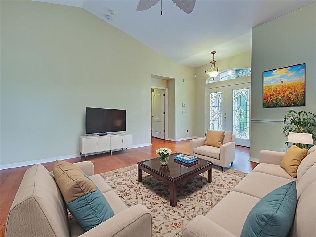 6265 Pheasant Road Venice, FL 34293 - Photo 27 of 70 a living room with furniture and a flat screen tv