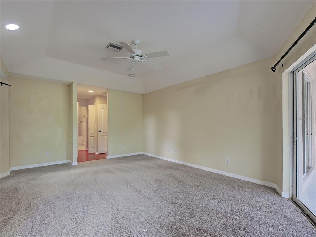 6265 Pheasant Road Venice, FL 34293 - Photo 30 of 70 a view of an empty room with a window