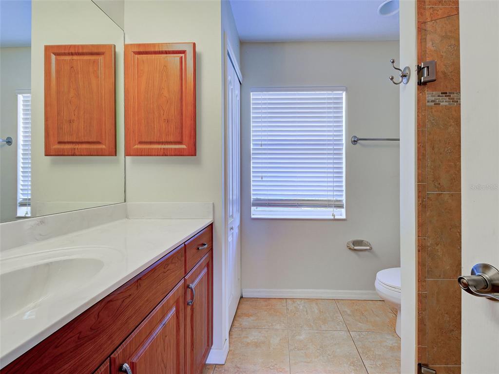 6265 Pheasant Road Venice, FL 34293 - Photo 63 of 70 a bathroom with a sink and a toilet