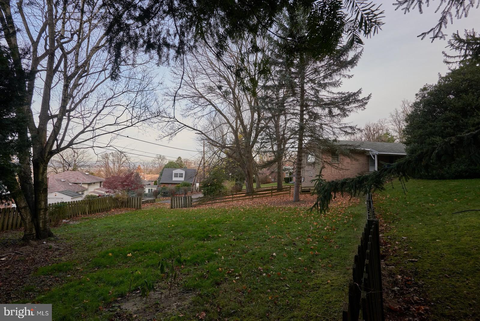 1200 Lorraine Road Reading, PA 19604 - Photo 9 of 45 View of side of home from fenced in side yard