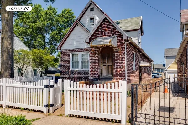 a front view of a house with a porch