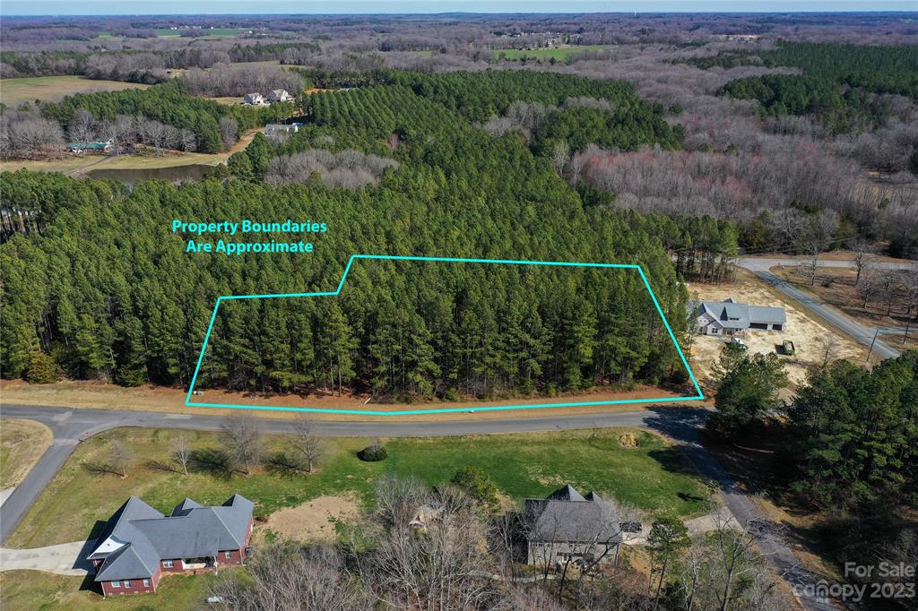 0 Garden Gate Drive Monroe, NC 28112 - Photo 2 of 11 an aerial view of a residential houses with outdoor space and trees