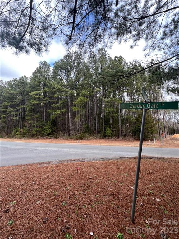 0 Garden Gate Drive Monroe, NC 28112 - Photo 9 of 11 a house with a yard