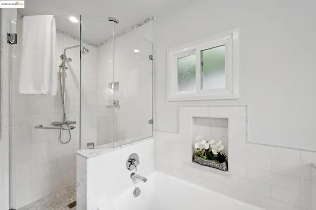 a bedroom with furniture and a wooden floor