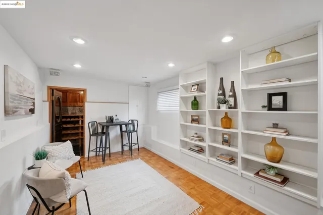 a view of a livingroom with furniture and front door