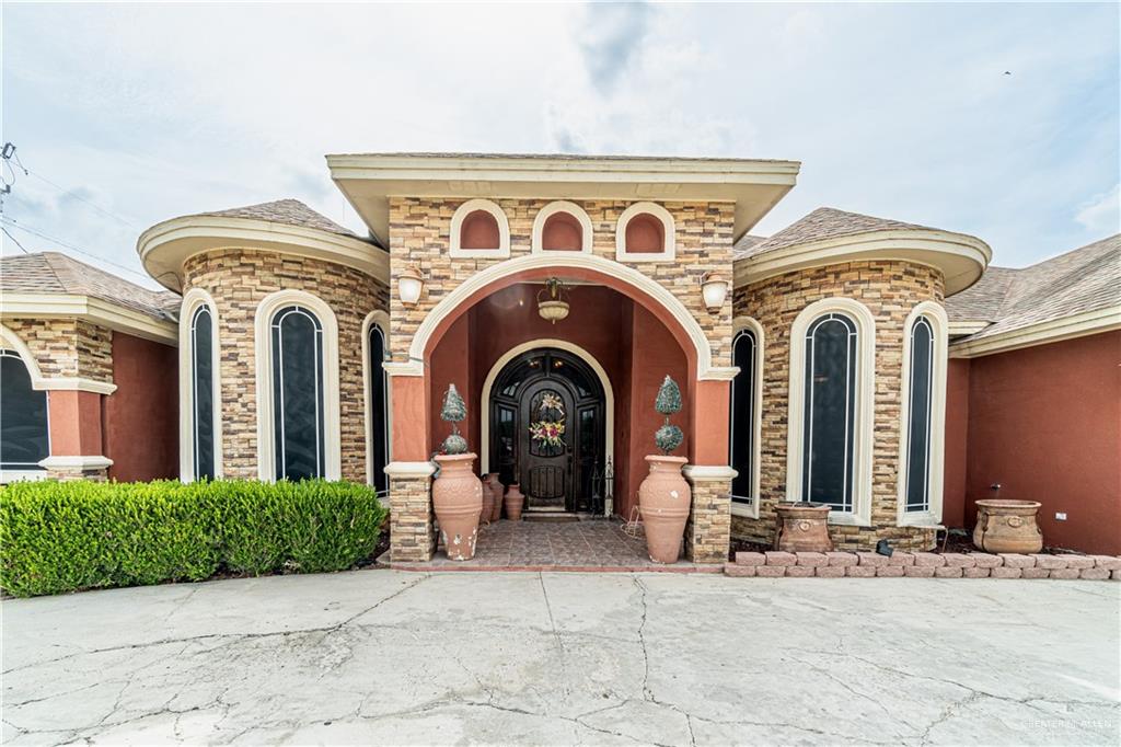 426 North FM 649 Rio Grande City, TX 78582 - Photo 2 of 16 a front view of a house with yard
