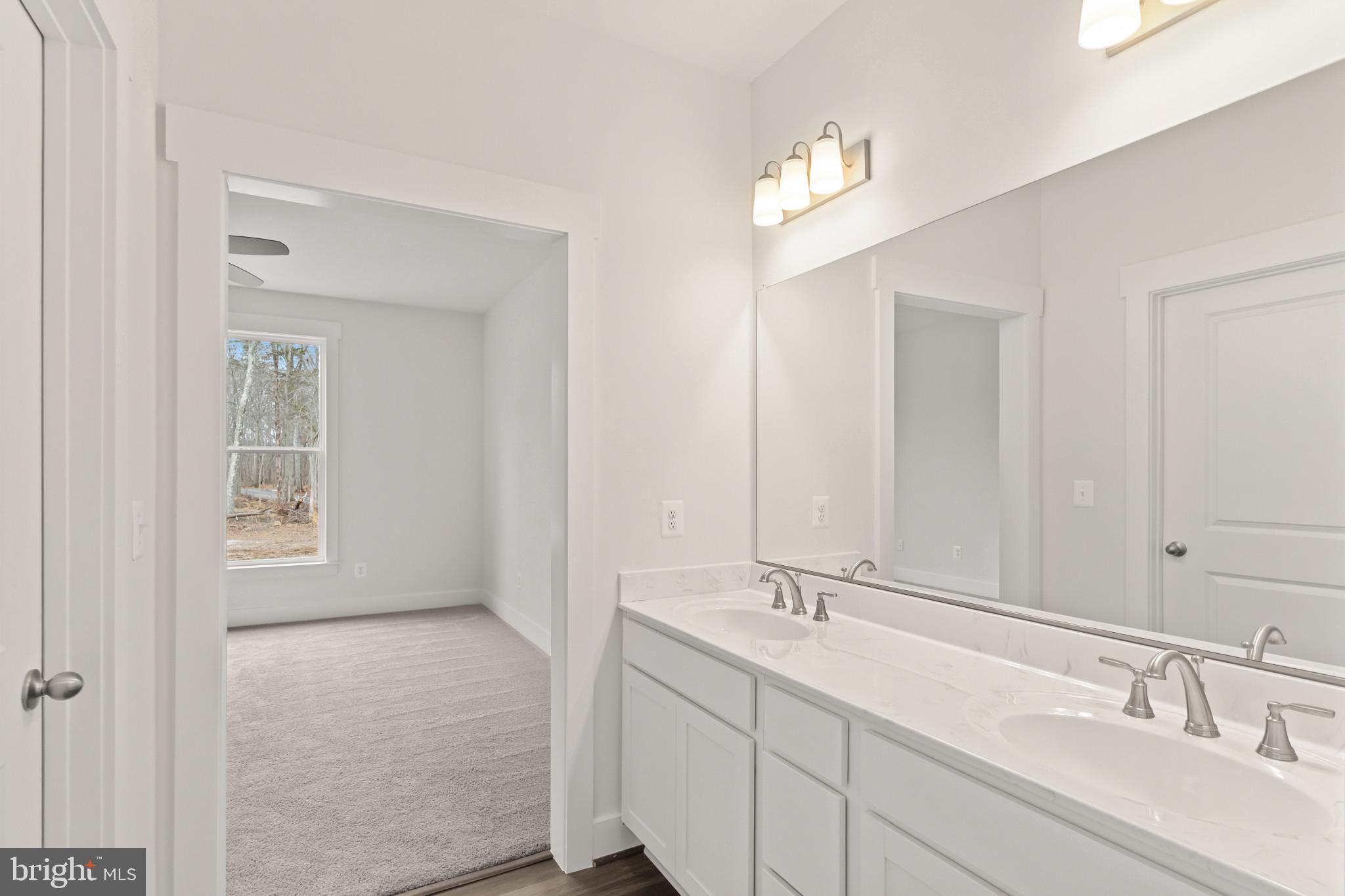 6735 Beverly Road Broad Run, VA 20137 - Photo 20 of 30 Bathroom featuring double vanity, dark colored car