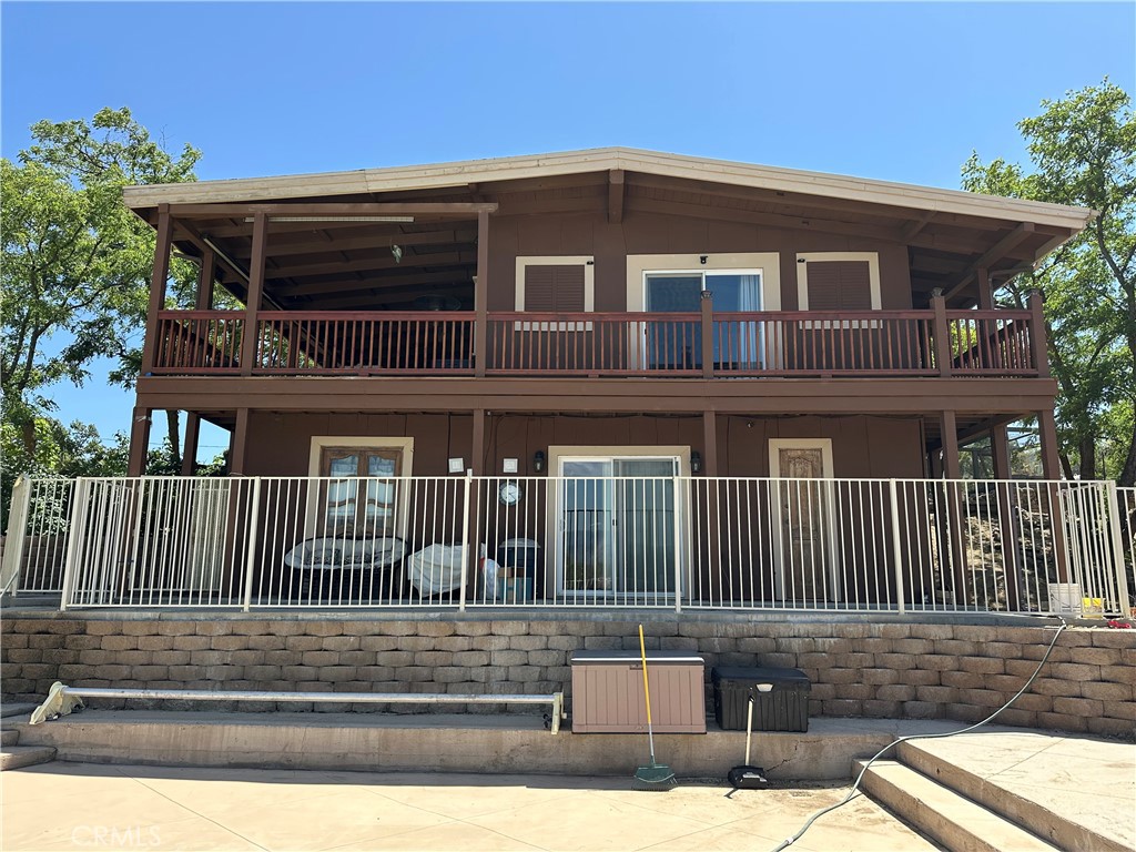 57260 Ramsey Road Anza, CA 92539 - Photo 12 of 44 a front view of a house with garden