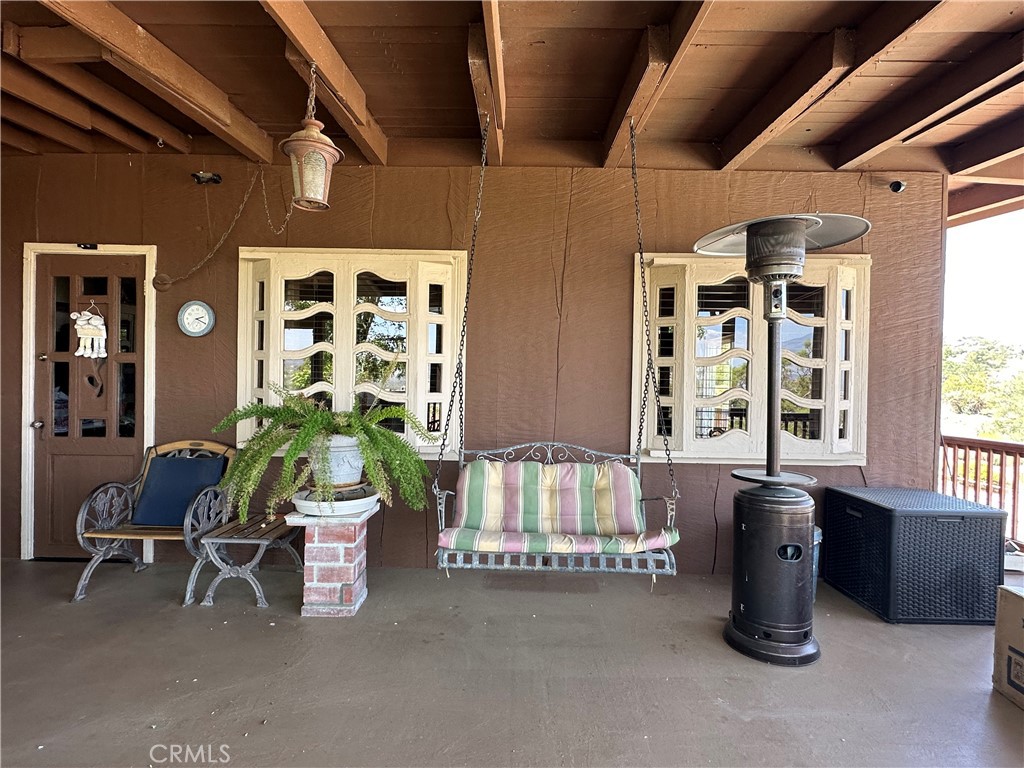 57260 Ramsey Road Anza, CA 92539 - Photo 10 of 44 a living room with furniture and windows