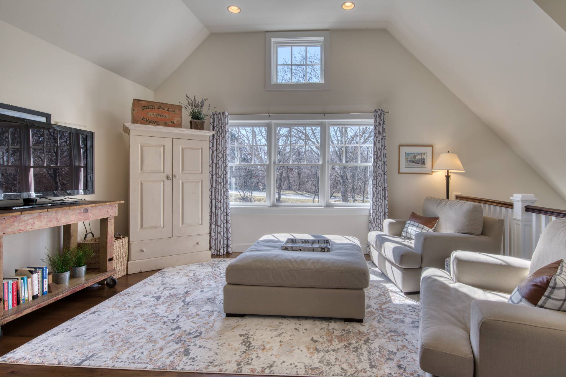 6 Wills Point Road Montauk, NY 11954 - Photo 7 of 16 a bedroom with furniture and a fireplace