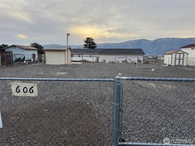 a view of a house with a back yard